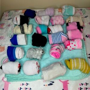 Assortment of newborn socks both grip and decorative included infant 0-12 mo